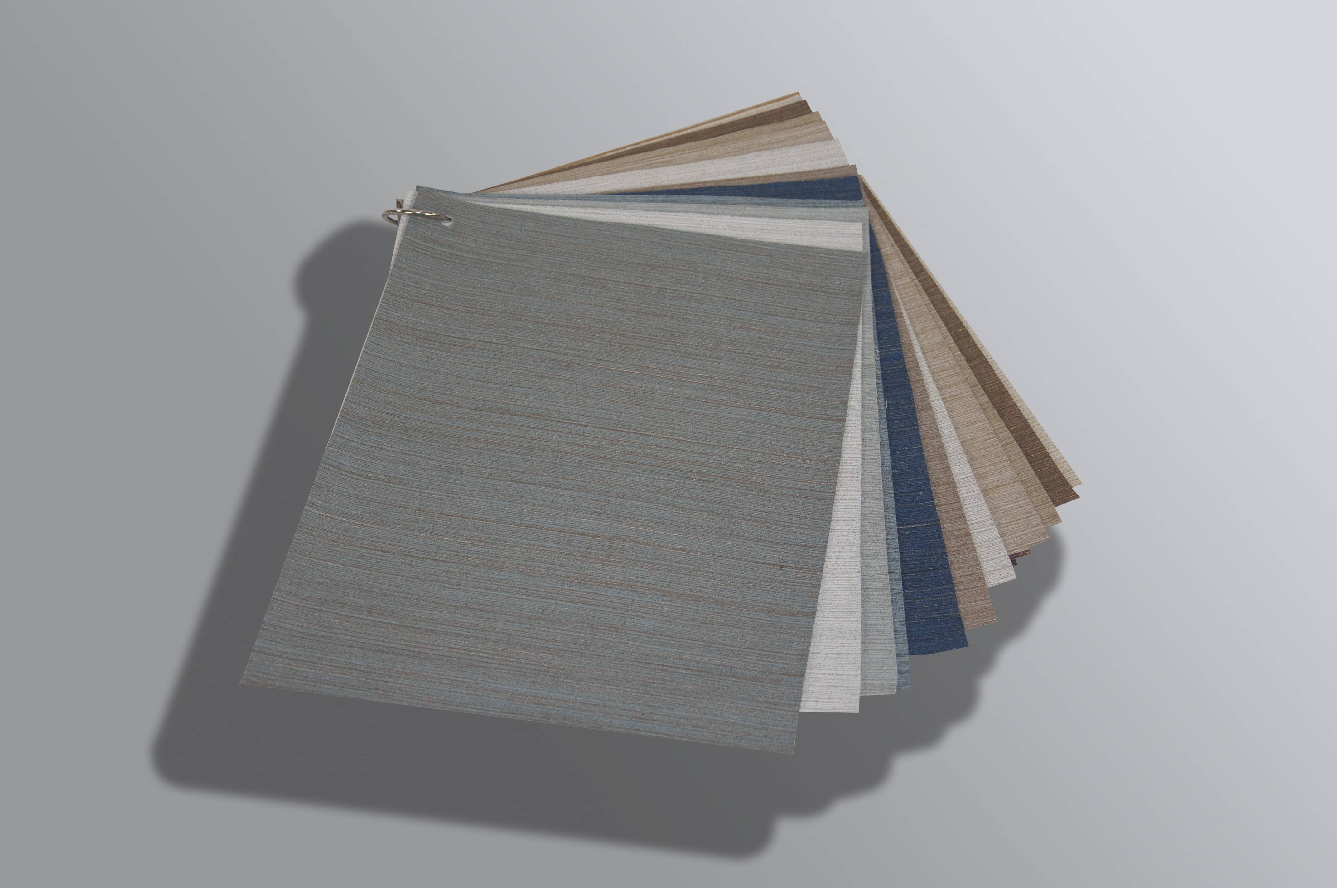 A fabric sample memo card form VIP Samples, displaying a textile swatches arranged on a ring for easy sorting.